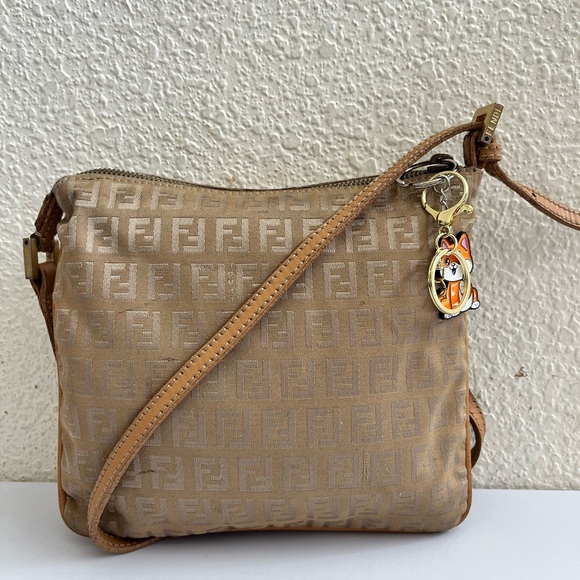 Fendi Handbags - Fendi Beige Crossbody Bag with Charm